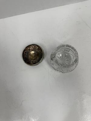 Sale Photo Thumbnail #19: Heavy, solid cut glass crystal  jar with sterling silver lid. Lid has a small dent, not very visible but can be felt, please see pictures.
Marked Sterling 925 Fine.