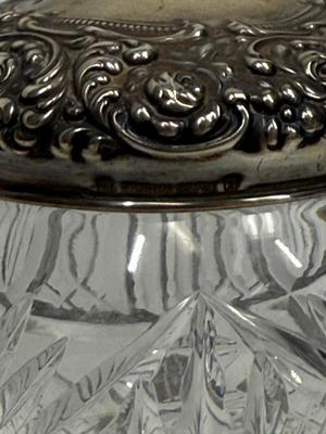 Sale Photo Thumbnail #20: Heavy, solid cut glass crystal  jar with sterling silver lid. Lid has a small dent, not very visible but can be felt, please see pictures.
Marked Sterling 925 Fine.