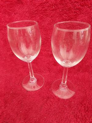 Set of 8 wine glasses w/ hexagonal stems. Look like new in the box.