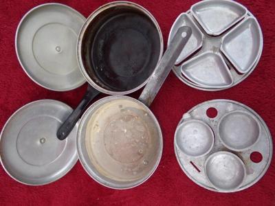 old egg poaching pans that have been used hard! For display only