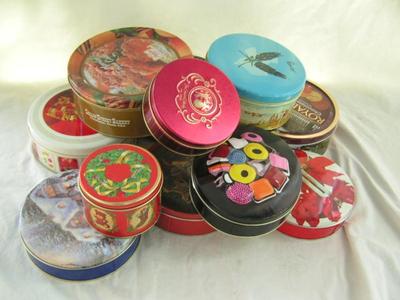 11 assorted tins, various sizes in a box