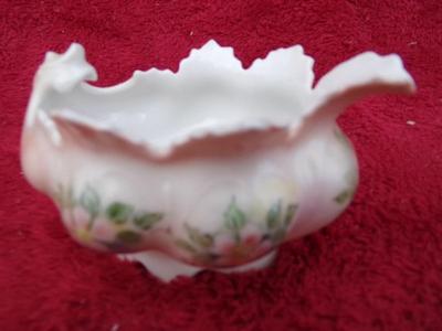 Antique. Highly stylized creamer. Manufactured by Moritz Zdekauer