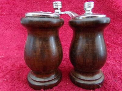 Wooden salt shake & pepper grinder.