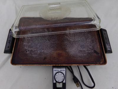PRESTO Automatic Electric Griddle. It’s NOT teflon, it's well seasoned