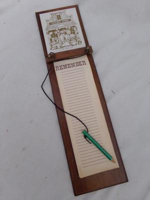 Wooden note pad board, hangs on wall or . . . about 16" tall x 4" wide.