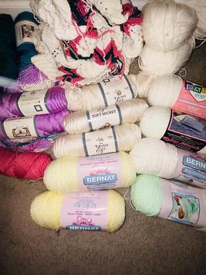 MILES OF SUPER SOFT YARN AND KNITTING NEEDLES