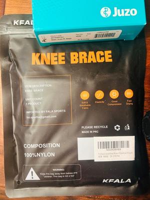 A VARIETY OF KNEE BRACES AND HAND WEIGHTS