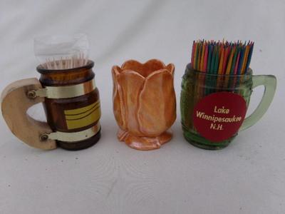 TRIO of toothpick holders and some toothpicks.