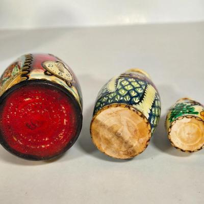LOT 102G: Christmas Themed Russian Nesting Dolls, Some with Makers Mark and Roly-Poly Musical Santa