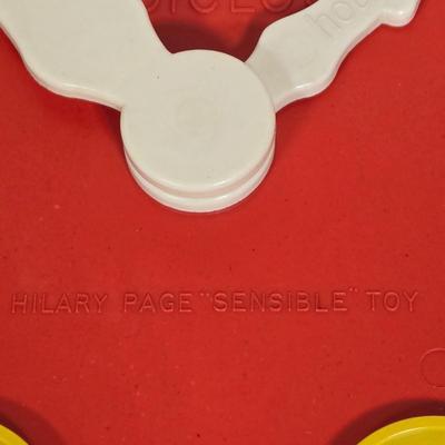 LOT 118G: Hillary Page Toy Clock, Vintage Spill and Spell Game, and Christmas Themed Block Set