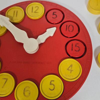 LOT 118G: Hillary Page Toy Clock, Vintage Spill and Spell Game, and Christmas Themed Block Set