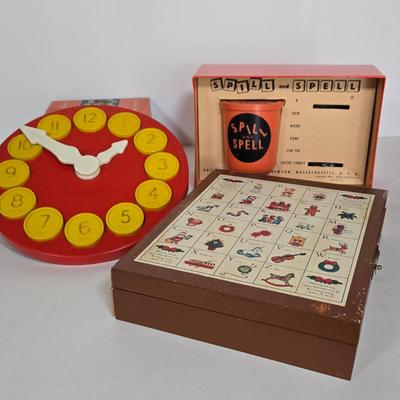 LOT 118G: Hillary Page Toy Clock, Vintage Spill and Spell Game, and Christmas Themed Block Set