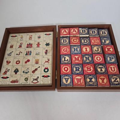 LOT 118G: Hillary Page Toy Clock, Vintage Spill and Spell Game, and Christmas Themed Block Set