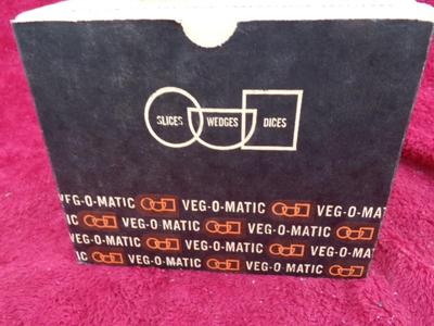 It’s the real deal, a GENUINE VEG-O-MATIC. It slice, it dices, it . . .