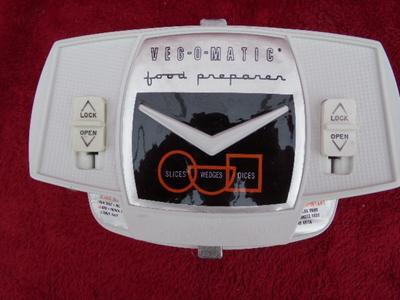 It’s the real deal, a GENUINE VEG-O-MATIC. It slice, it dices, it . . .