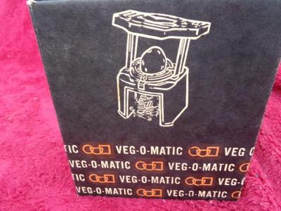 It’s the real deal, a GENUINE VEG-O-MATIC. It slice, it dices, it . . .