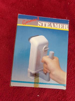 Garment Steamer: Hand held clothing steamer for home or travel