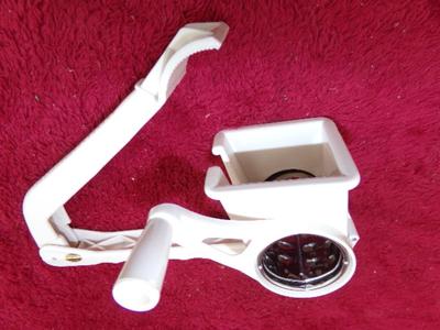 VTG c.50s hand held & operated shredder/slicer device.