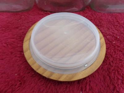 Three in a row! Square glass canisters. wooden lids with . . . .