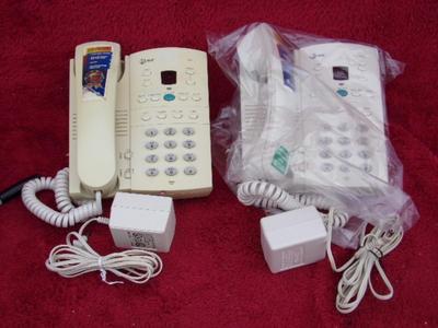TWO AT&T corded home phone with answering system.