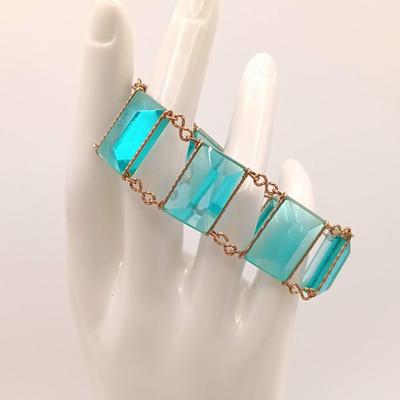 LOT 122: Vintage Gold-Tone Wire and Blue Resin Jewelry Set