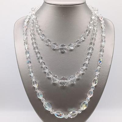 LOT 135: 20" Two strands of Aurora Borealis Crystal Beads, one with Diamond and Silver Clasps