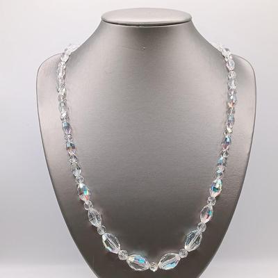 LOT 135: 20" Two strands of Aurora Borealis Crystal Beads, one with Diamond and Silver Clasps