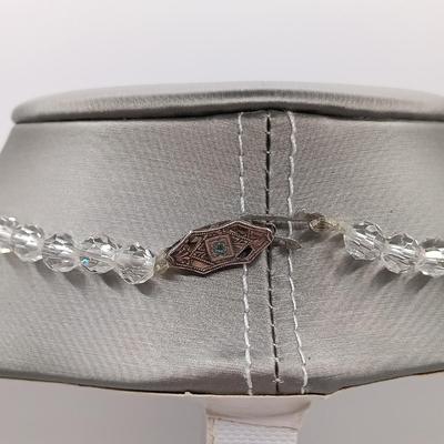 LOT 135: 20" Two strands of Aurora Borealis Crystal Beads, one with Diamond and Silver Clasps