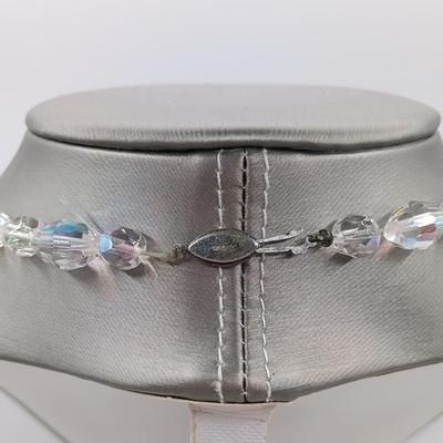 LOT 135: 20" Two strands of Aurora Borealis Crystal Beads, one with Diamond and Silver Clasps