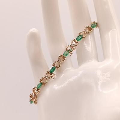 LOT 172: Vintage 14K Gold Emerald and Diamond Tennis Bracelet 11.3gtw