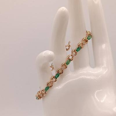 LOT 172: Vintage 14K Gold Emerald and Diamond Tennis Bracelet 11.3gtw