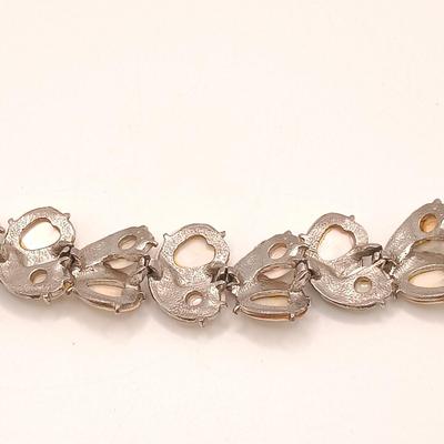 LOT 175: Monet Chunky Cable Bracelet, Vintage Capri Shell Bracelet, Bird Pendant & More