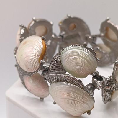 LOT 175: Monet Chunky Cable Bracelet, Vintage Capri Shell Bracelet, Bird Pendant & More