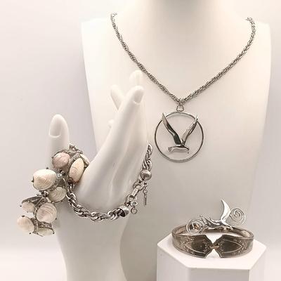 LOT 175: Monet Chunky Cable Bracelet, Vintage Capri Shell Bracelet, Bird Pendant & More