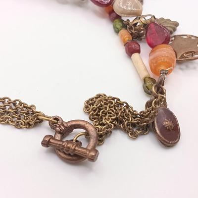 LOT 176: Vintage Jan Michaels Snake Tassle Necklace, Heavy Stone Bracelet, Painted Wood Earrings & More