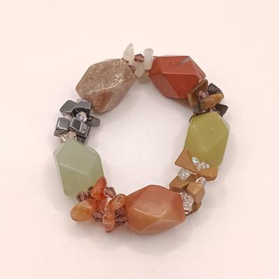 LOT 176: Vintage Jan Michaels Snake Tassle Necklace, Heavy Stone Bracelet, Painted Wood Earrings & More