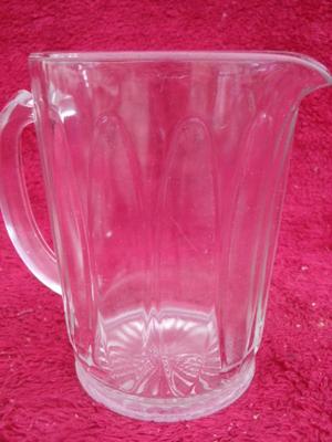 GOT JUICE? A small juice pitcher with citrus juicer. They go together