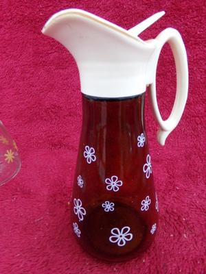 Group of 4 pancake/waffle syrup carafes of various sizes & styles.