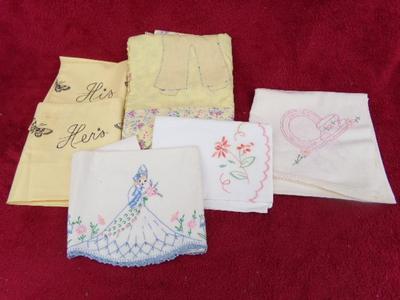 A collection of hand crafted items. Crocheted and embroidered items.