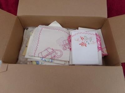 A collection of hand crafted items. Crocheted and embroidered items.