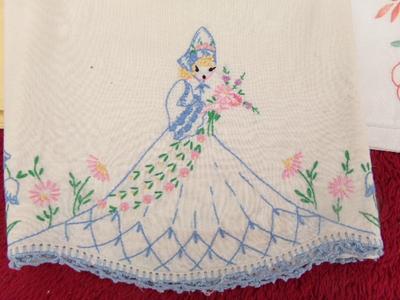 A collection of hand crafted items. Crocheted and embroidered items.