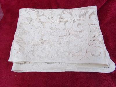 A collection of hand crafted items. Crocheted and embroidered items.
