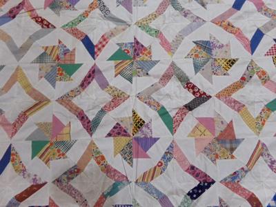 Pinwheel quilt top only. This needs your TLC to complete & quilt it.
