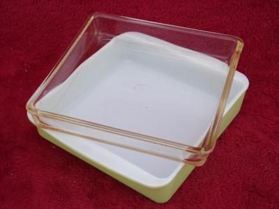 A couple of PYREX baking dishes, both about 9" square.