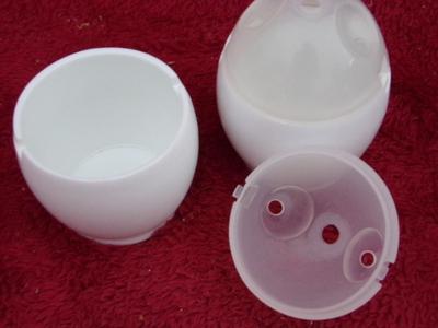 Group of 3 kinds of egg cooking devices for the microwave.