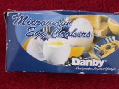 Group of 3 kinds of egg cooking devices for the microwave.