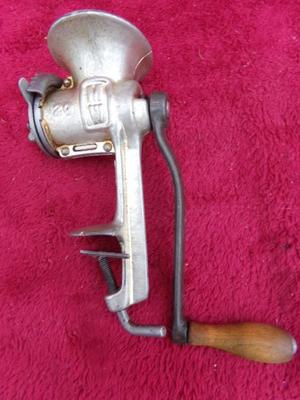 Small hand operated meat grinder. Old school but they always work.