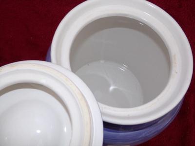 Water/cold drink table top dispenser. Ceramic. Looks like new.
