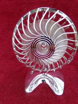 A tiny little battery operated fan. We tested it and it works good.