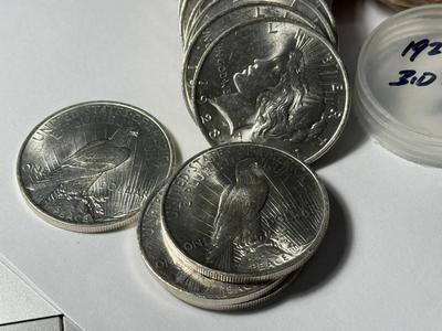 ROLL OF (20) 1923-P UNCIRCULATED PEACE SILVER DOLLARS AT GREYSHEET CDN BID PRICE.